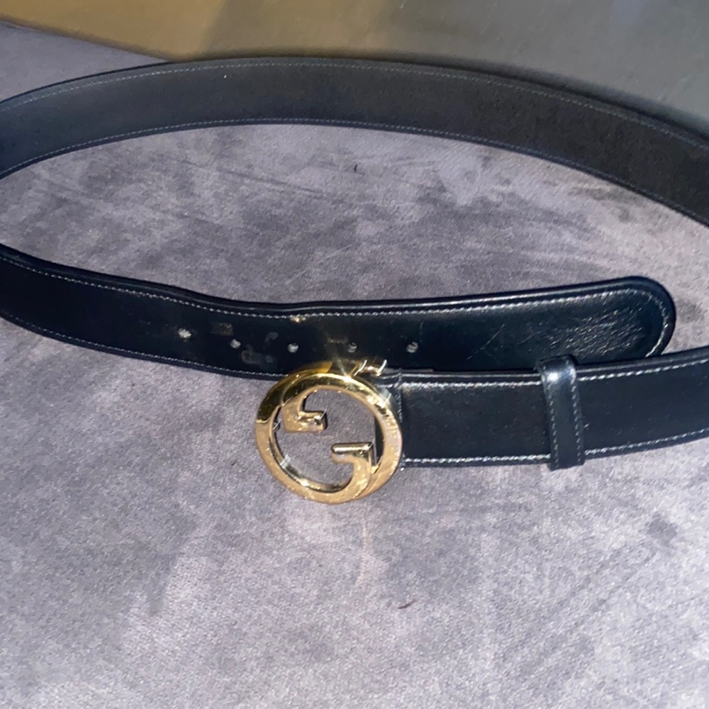 It has a few scratches on the buckle other then that excellent condition